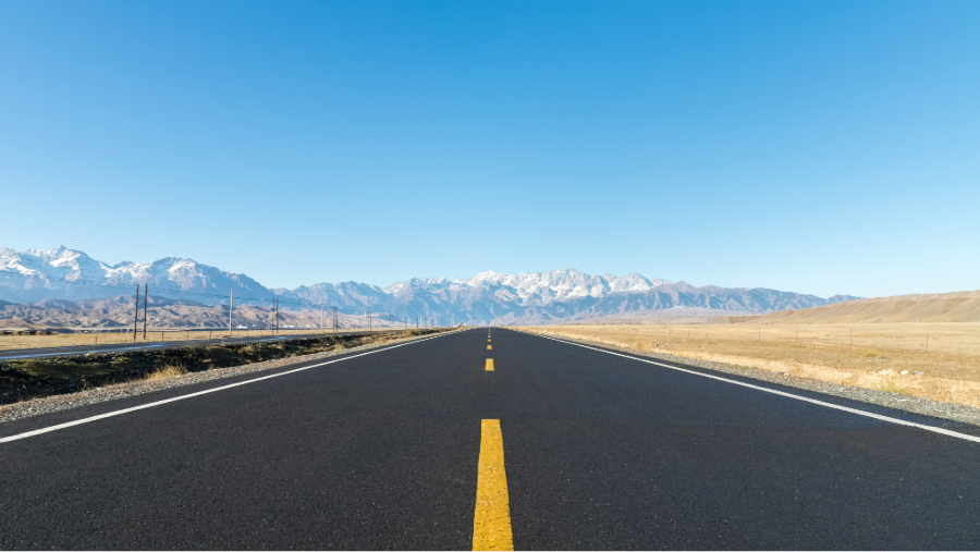 Asphalt highway fading off into the distance