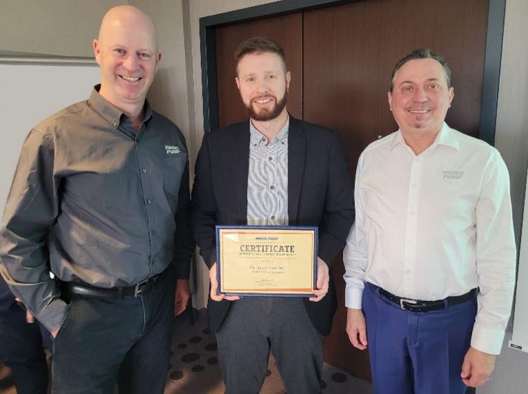 Jason Downing proudly accepts a Certificate of Excellence for the Highest Viking Pump Sales in 2023. Presented by Viking Pump’s European management team:  Barry McMahon, Regional Sales Manager, Europe (left) and Eduard Weis, Distribution Sales Director, Europe (right).